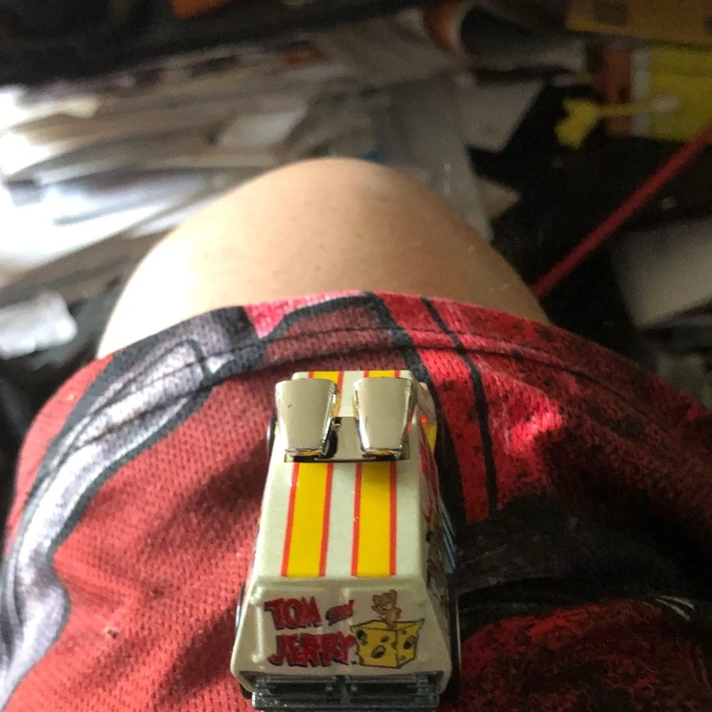 Vintage Toy Car with Yellow & Orange Racing Stripes